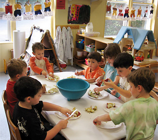 Kids preparing apples
