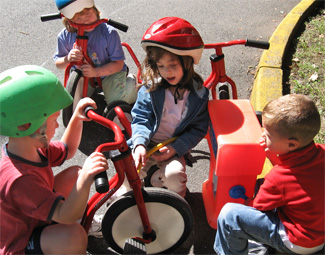 Kids 'filling up' trikes
